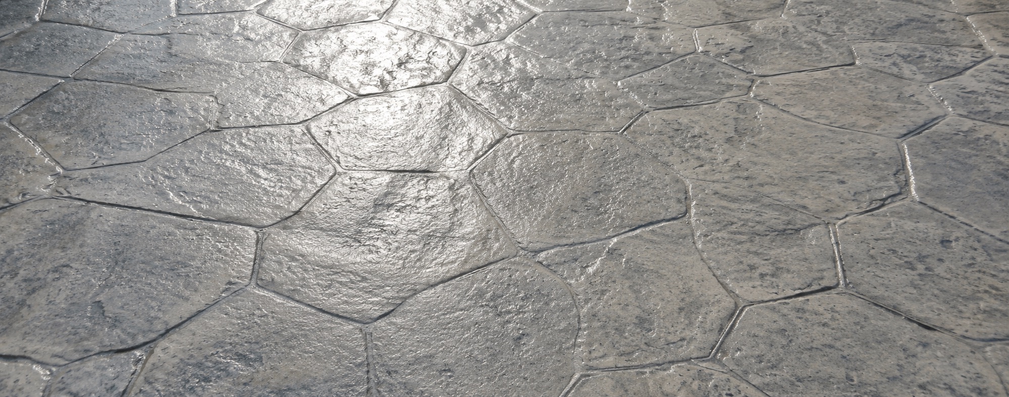 Sealing finished stamped concrete for durability